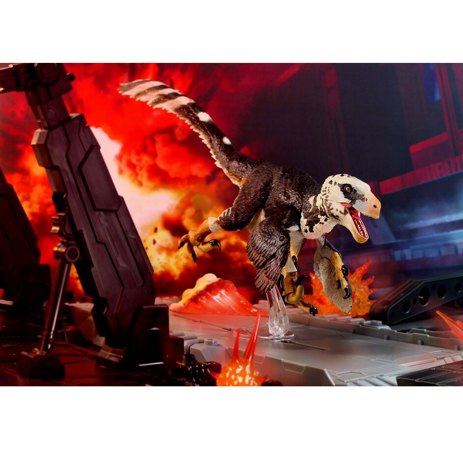 A dramatic dromaeosaurid action figure shot.